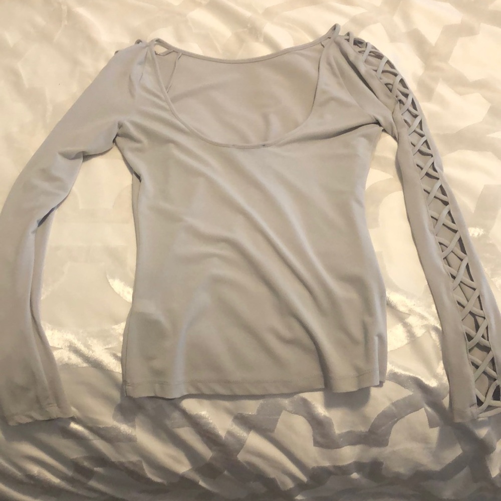 Bebe. Womens silver top size small